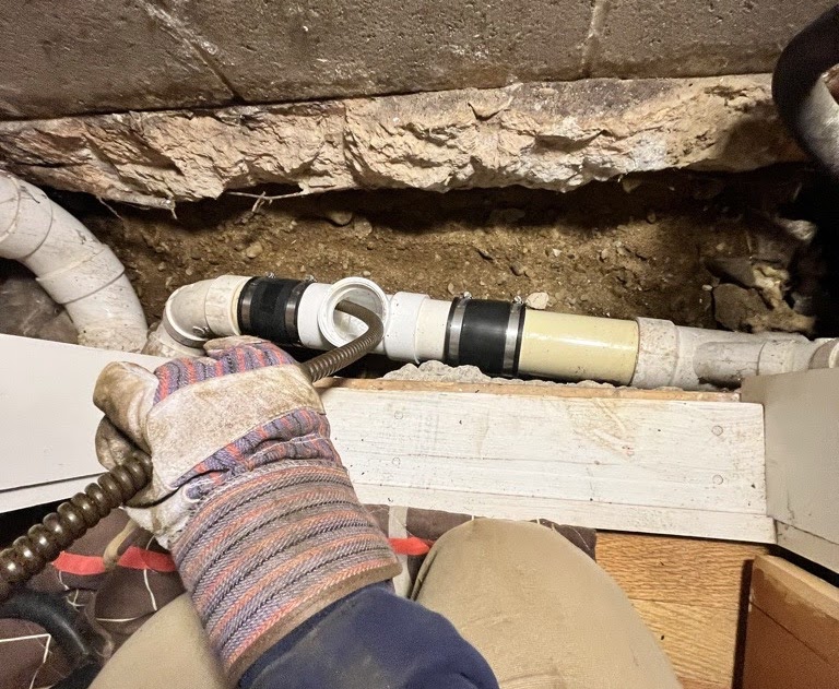 Fixing a pipe in York, ME